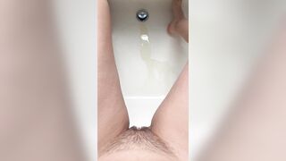 POV Peeing in Empty Bathtub