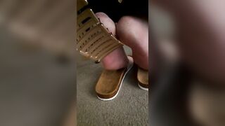 Mature feet tickle under chair 2