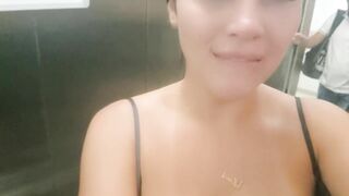 Cute women caught squirting at the hotel's elevator