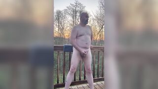 Masturbating on the deck while enjoying nature and the sunrise