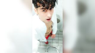 Jerk off at spa toilet in bathrobe before the pool