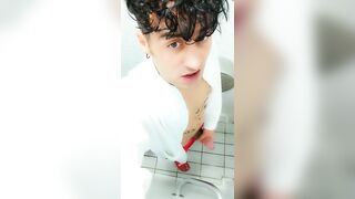 Jerk off at spa toilet in bathrobe before the pool