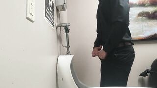 Pissing at public urinal and jerk off before someone comes in