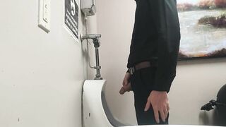 Pissing at public urinal and jerk off before someone comes in