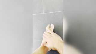 Pretty male feet getting creamed