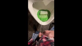 Pissing into a urinal in a pub. I play football with urine