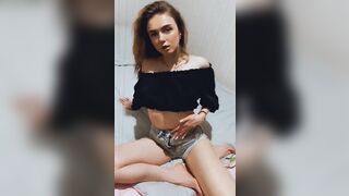 She spread her legs and showed her smooth pussy. Didlo masturbation.