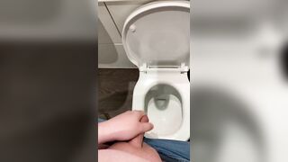 Wanking off in public cubicle with big cumshot at the end