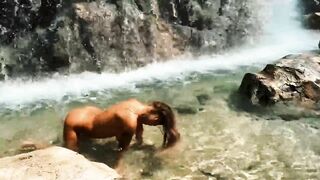 Monika Fox Posing Naked Under A Waterfall