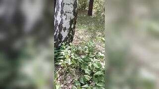 Masturbating on the tree using dry twig. Hairy cunt in the forest