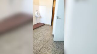 Jerking off in public toilet