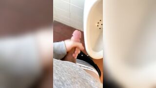 Jerking off in public toilet