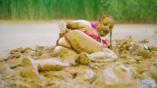 Orgasm in lake of mud