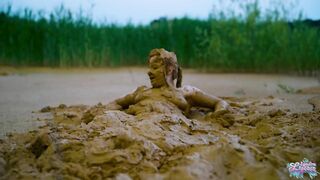 Orgasm in lake of mud