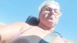 Tits out while riding in a convertible