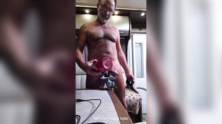 Balls crushed in a vice and hands free orgasm with stroking machine