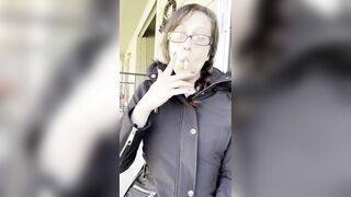 Goddess D Smoking Marlboro Light 100 Outside with Glasses on