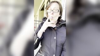 Goddess D Smoking Marlboro Light 100 Outside with Glasses on