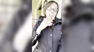 Goddess D Smoking Marlboro Light 100 Outside with Glasses on