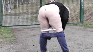 Pissing on a public road outdoors. Voyeur watching mature milf with big butt in white panties. Dirty fetish. ASMR. PAWG.