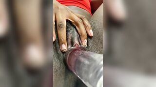 Petite black hairy teen with big pink clit gets her tiny pussy stretched with big clear dildo