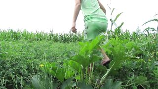 Good pissing in nature on a zucchini bush