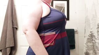 Caressing my curves in my new Captain Marvel dress!