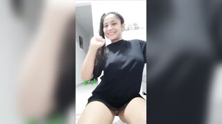 Latina dances showing her juicy pink pussy and round ass