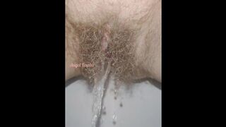 Sensual Slow Motion Piss by Mega Hairy Pussy Up Close