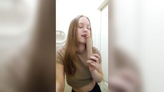 Sexy girl performs oral sex with a dildo.