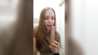 Sexy girl performs oral sex with a dildo.