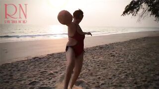 Nice Lady at Lonely Nudist Beach. Red Swimsuit. Red Bikini.