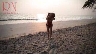 Nice Lady at Lonely Nudist Beach. Red Swimsuit. Red Bikini.