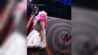 WWE - Alexa Bliss turning a crank at Wrestlemania 37